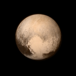 Image from the Long Range Reconnaissance Imager (LORRI) aboard NASA's New Horizons spacecraft, taken on 13 July 2015. Pluto is dominated by the feature informally named the "Heart." (Image Credit: NASA/APL/SwRI)
