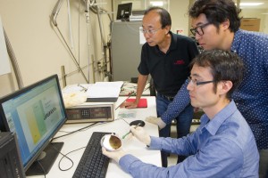 Stanford electrical engineering professor H.-S. Philip Wong, left, graduate student Joon Sohn and postdoctoral fellow Seunghyun Lee (seated) are developing high-capacity, energy-efficient memory chips that are not based on silicon. (Photo: Norbert von der Groeben)